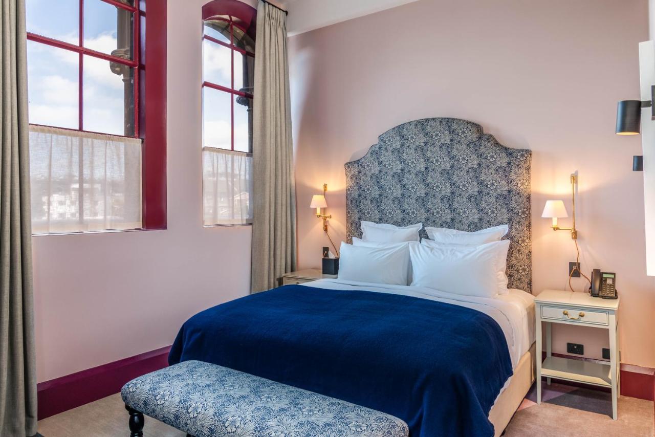 The Observatory Hotel クライストチャーチ エクステリア 写真 A bedroom at the hotel